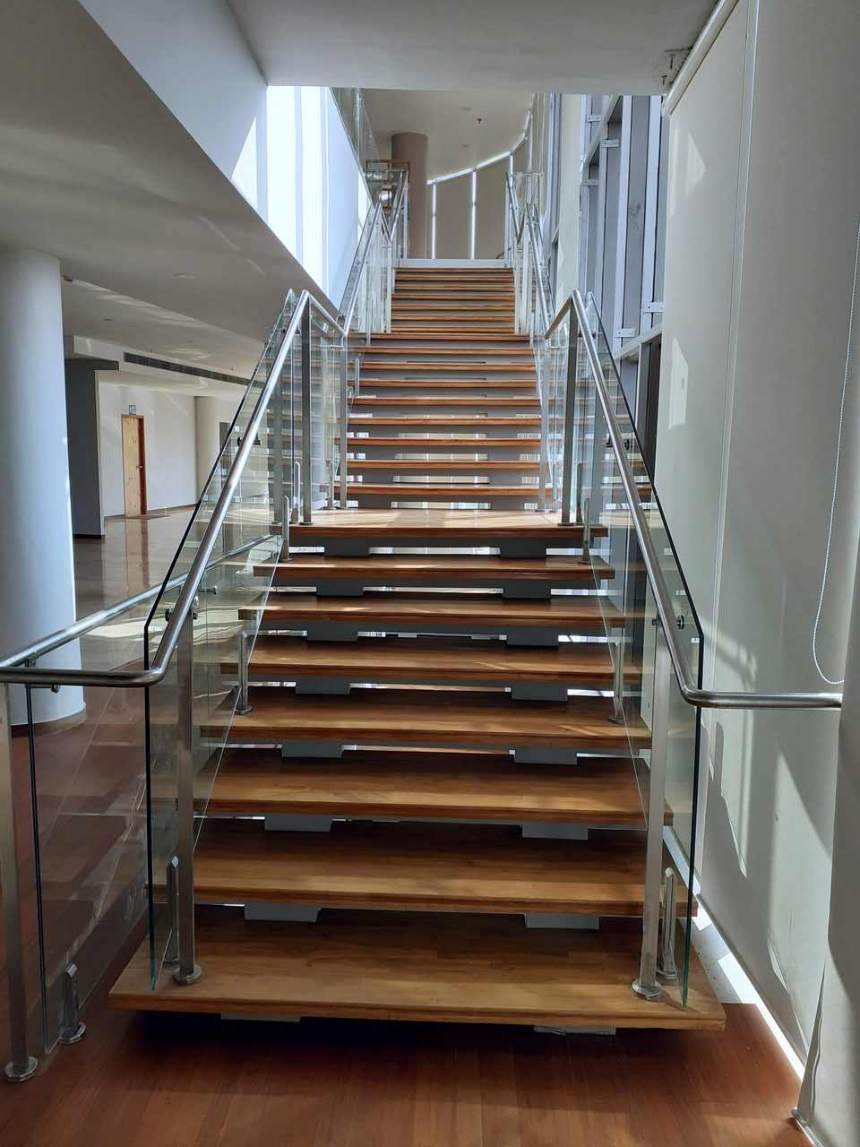 Stainless steel and glass railing on an interior staircase